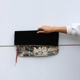 pierce pouch | licorice suede | running horses