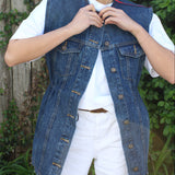 THE cinch denim vest